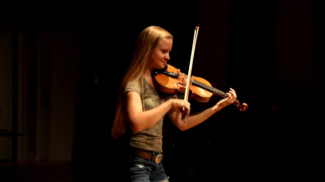 Hillary Klug Stomps Her Feet While Playing ‘cotton Eyed Joe On The Violin Inner Strength Zone 3034