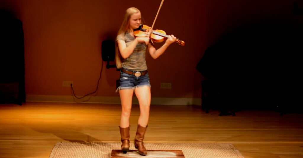 Hillary Klug Stomps Her Feet While Playing ‘Cotton Eyed Joe’ On The
